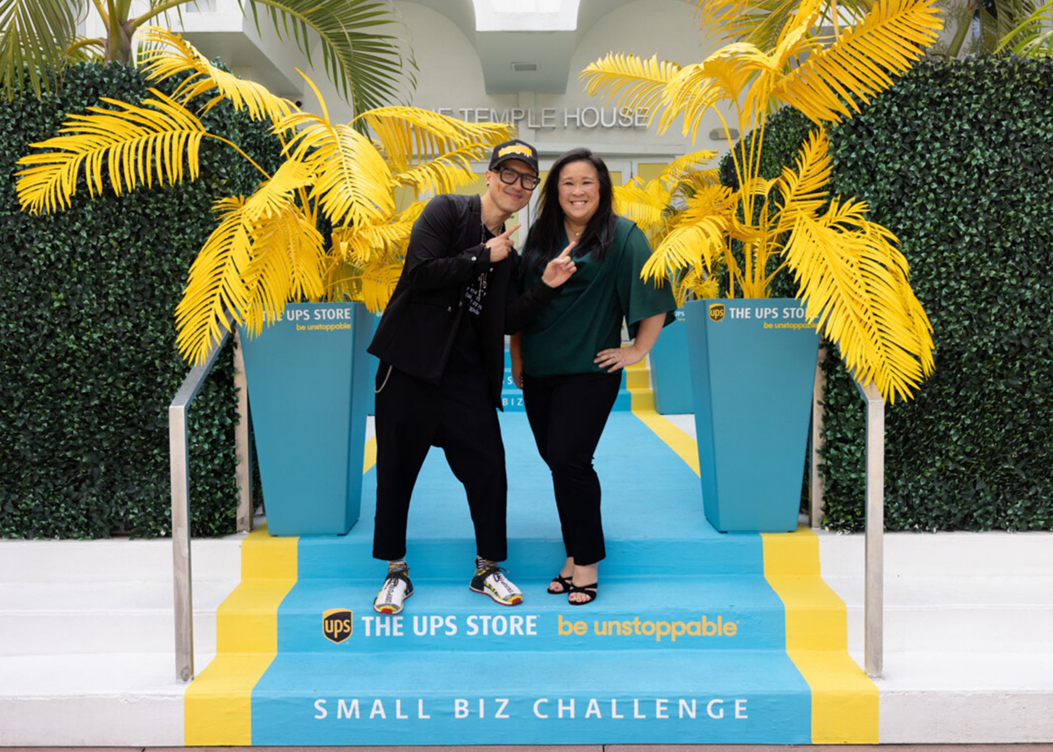 The UPS Store Small Biz Challenge finalist standing next to their mentor